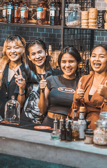 happy Thai students at the live bar training together